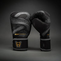 Venum Matupa - Negro/Gris/Dorado (12oz)