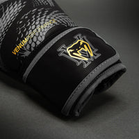 Venum Matupa - Negro/Gris/Dorado (12oz)